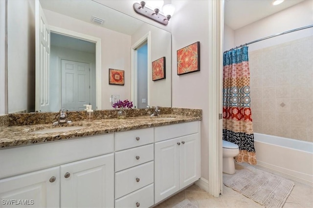 full bathroom featuring tile patterned floors, vanity, shower / bath combo, and toilet