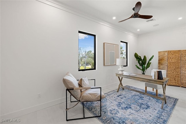 home office featuring ceiling fan and ornamental molding