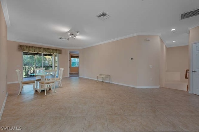 unfurnished room with ornamental molding