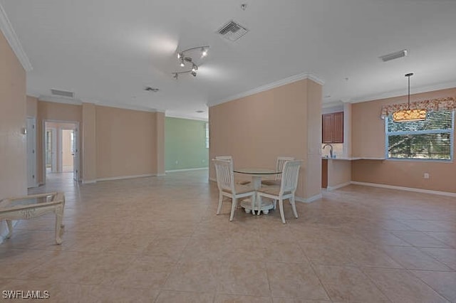 unfurnished dining area with crown molding and light tile patterned floors