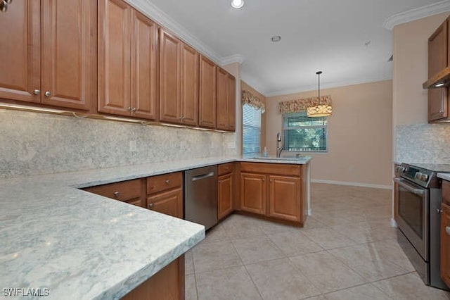 kitchen featuring sink, hanging light fixtures, stainless steel appliances, ornamental molding, and kitchen peninsula