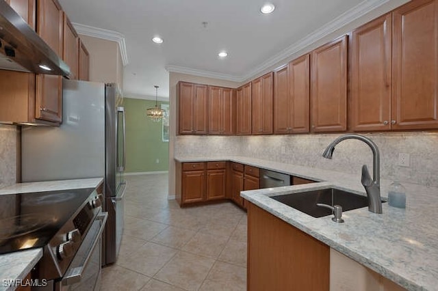 kitchen with light stone counters, sink, ornamental molding, and stainless steel appliances