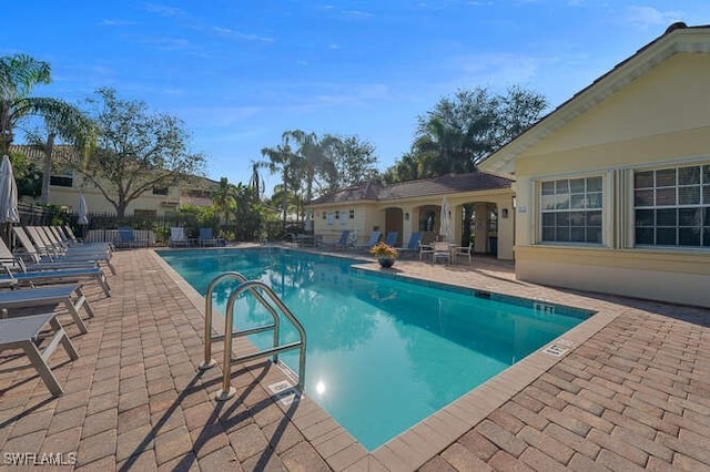 view of pool featuring a patio area