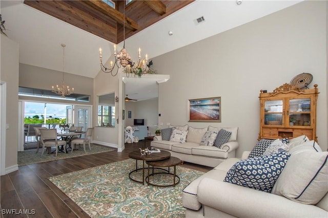 living room featuring beamed ceiling, high vaulted ceiling, and ceiling fan with notable chandelier