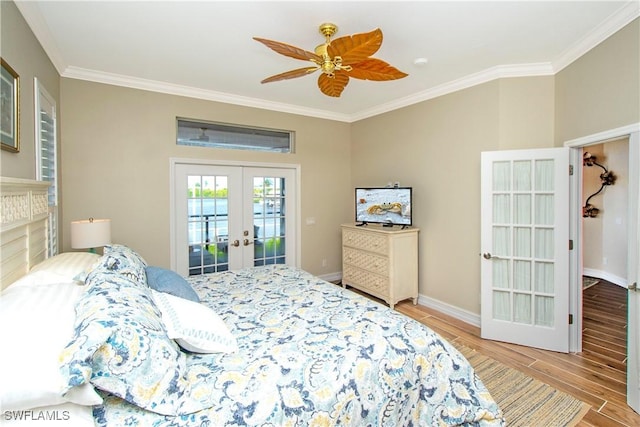 bedroom with access to outside, ceiling fan, french doors, and ornamental molding