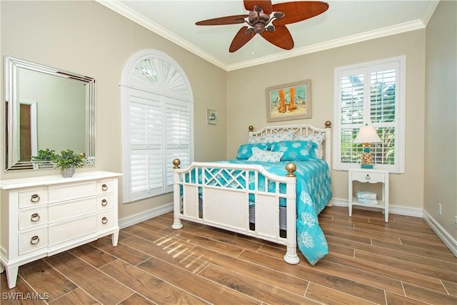 bedroom featuring ceiling fan and ornamental molding