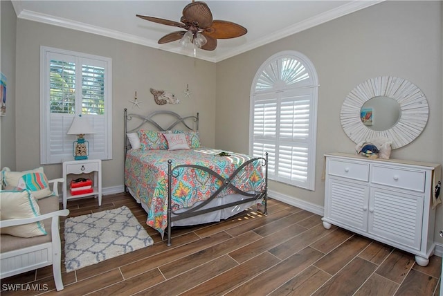 bedroom featuring ceiling fan and crown molding