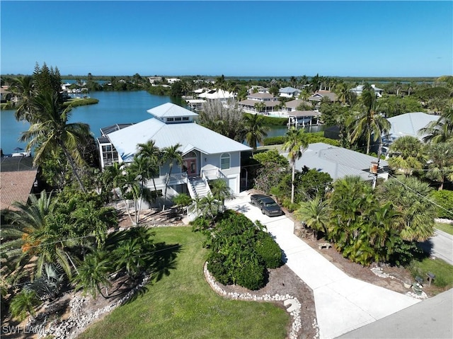 drone / aerial view featuring a water view