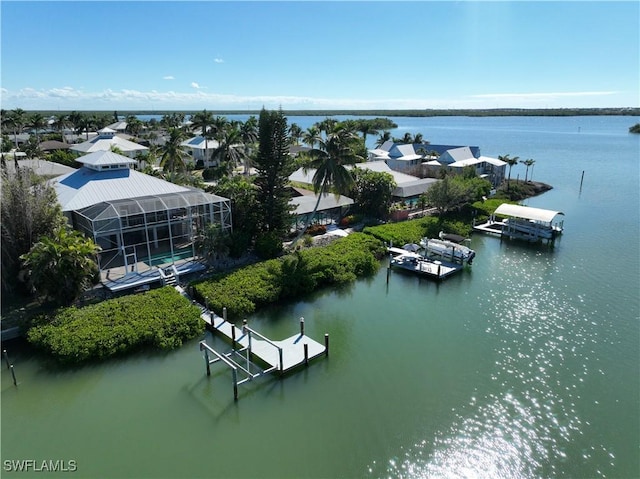 bird's eye view with a water view