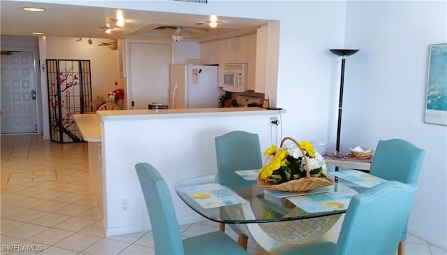 view of tiled dining space