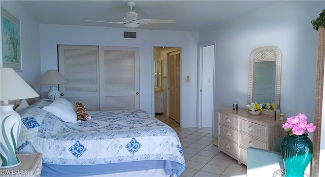 bedroom featuring ceiling fan and light tile patterned floors