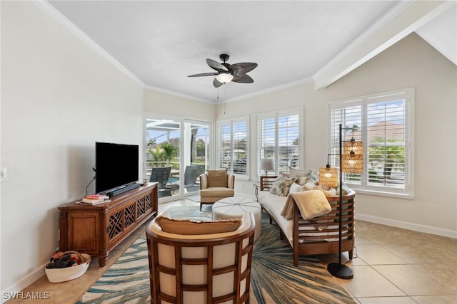 interior space with vaulted ceiling, ceiling fan, ornamental molding, and light tile patterned flooring