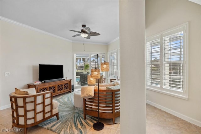 living room with ceiling fan, ornamental molding, and light tile patterned flooring