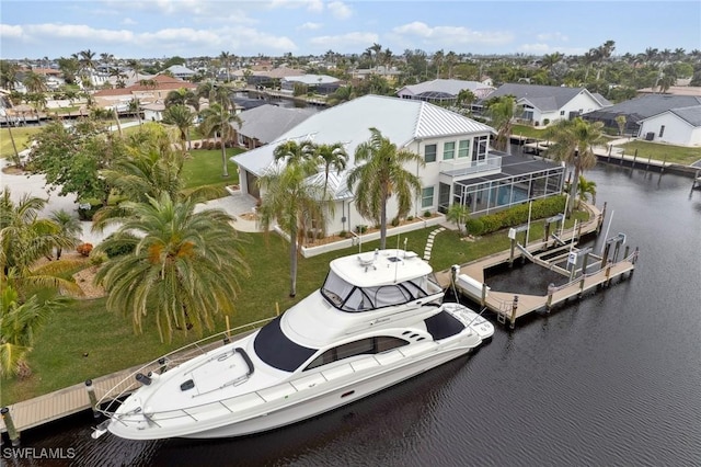 aerial view with a residential view and a water view