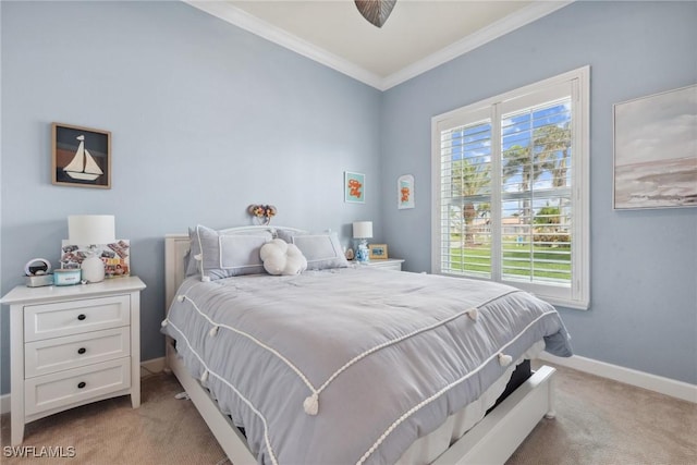 bedroom with light carpet, crown molding, baseboards, and multiple windows