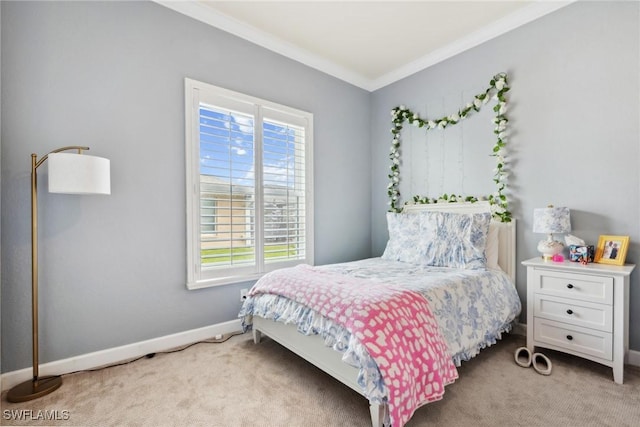 bedroom with light colored carpet and crown molding