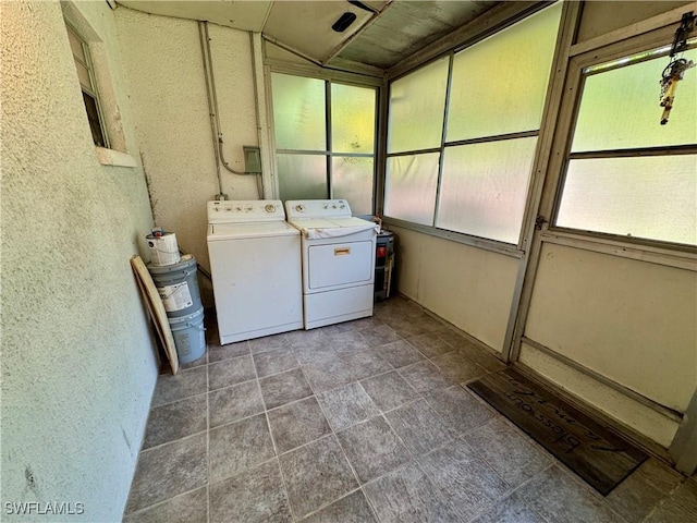 laundry room featuring laundry area and washing machine and dryer