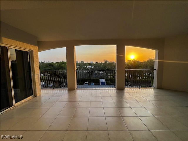 view of patio terrace at dusk