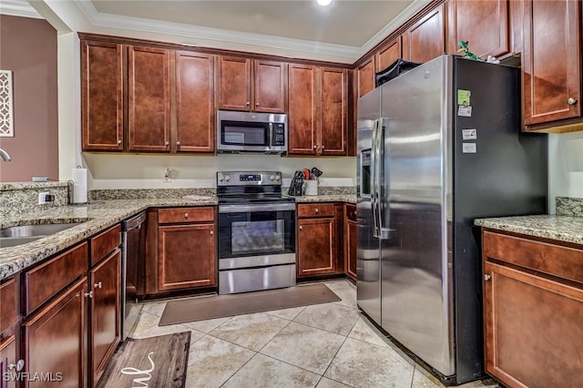 kitchen with light stone countertops, sink, crown molding, light tile patterned floors, and appliances with stainless steel finishes