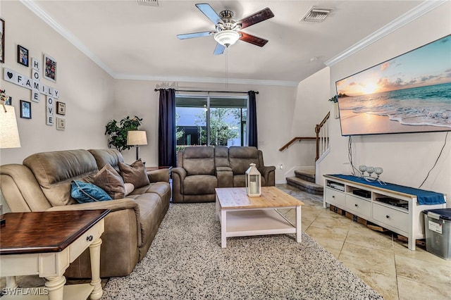 living room featuring ceiling fan, crown molding, and light tile patterned flooring