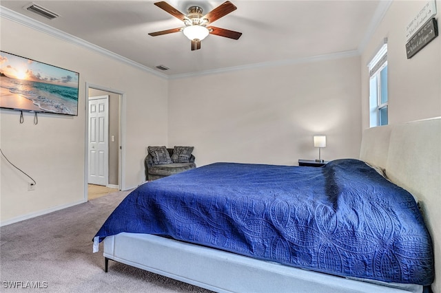 bedroom with carpet flooring, ceiling fan, and ornamental molding