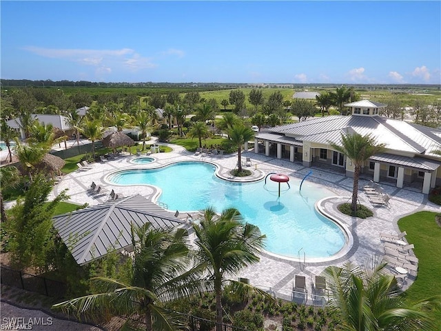 view of pool featuring a patio area