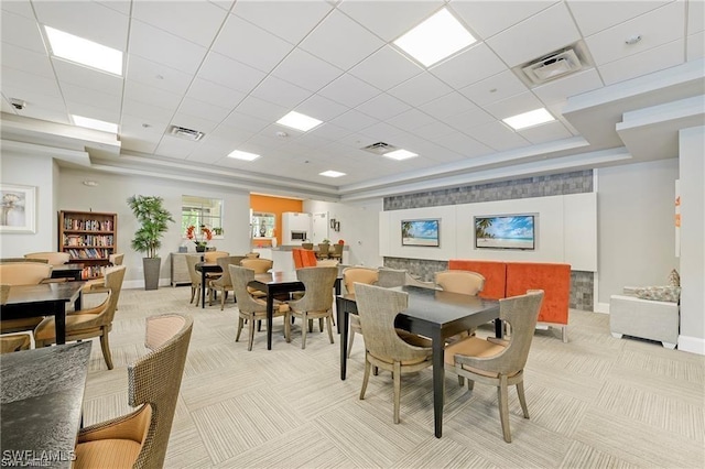 dining room featuring light colored carpet