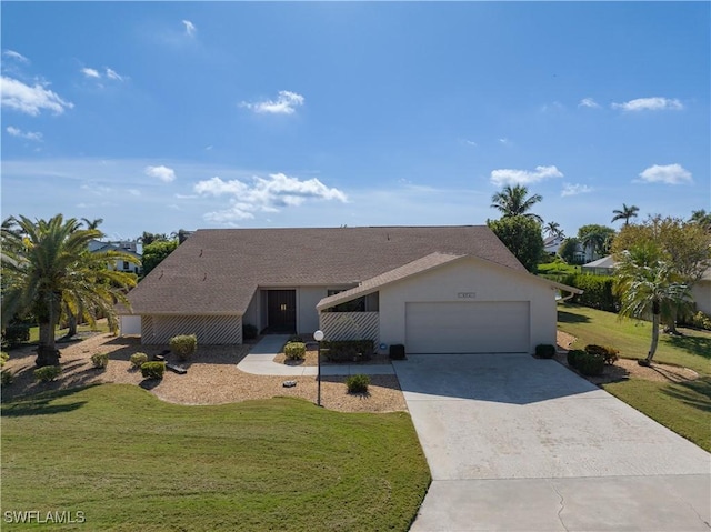 single story home with a front yard and a garage