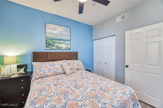 bedroom featuring ceiling fan and a closet