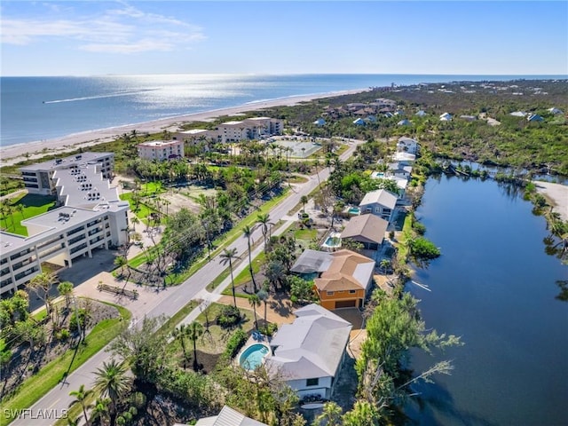 aerial view with a beach view and a water view