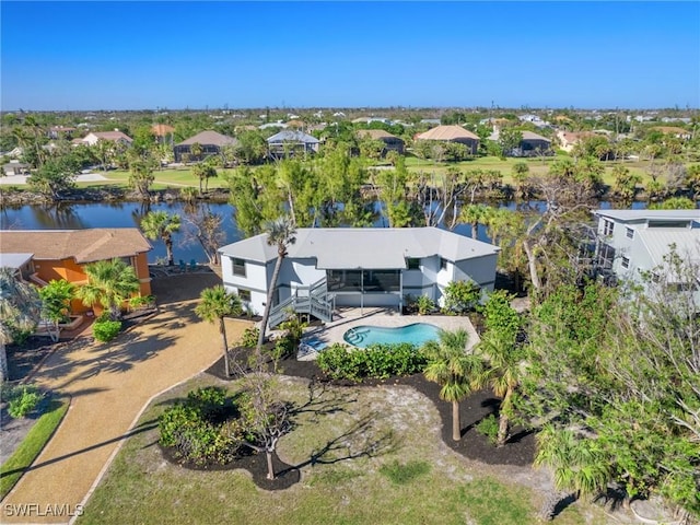 drone / aerial view featuring a water view