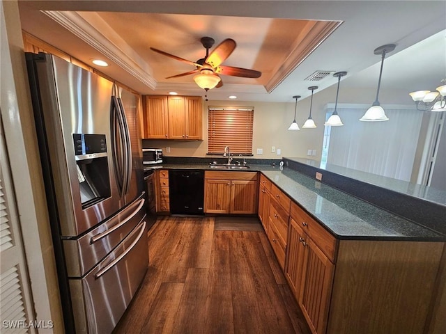 kitchen with kitchen peninsula, stainless steel refrigerator with ice dispenser, a raised ceiling, dishwasher, and hanging light fixtures