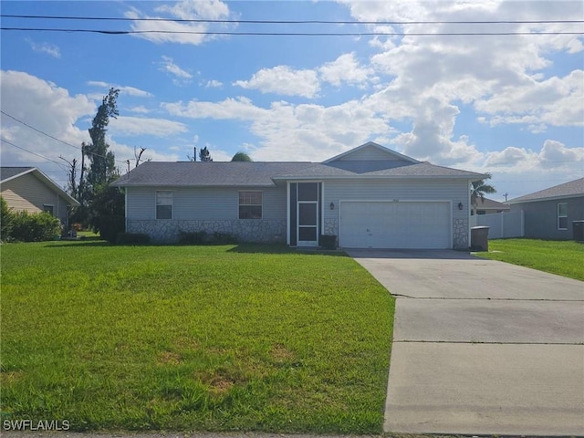 ranch-style house with a garage and a front lawn