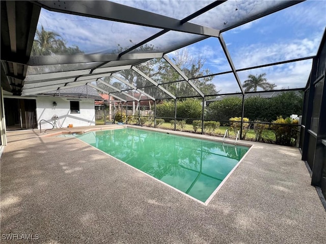 view of pool featuring a lanai and a patio area