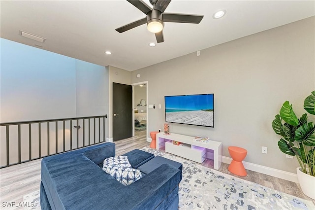 bedroom featuring ceiling fan and light hardwood / wood-style floors