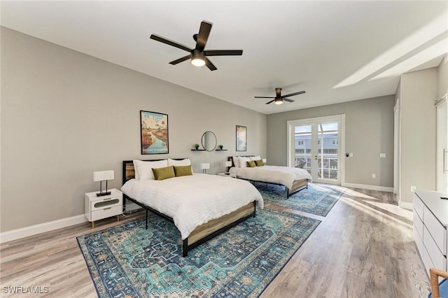 bedroom with ceiling fan, access to exterior, and light hardwood / wood-style flooring