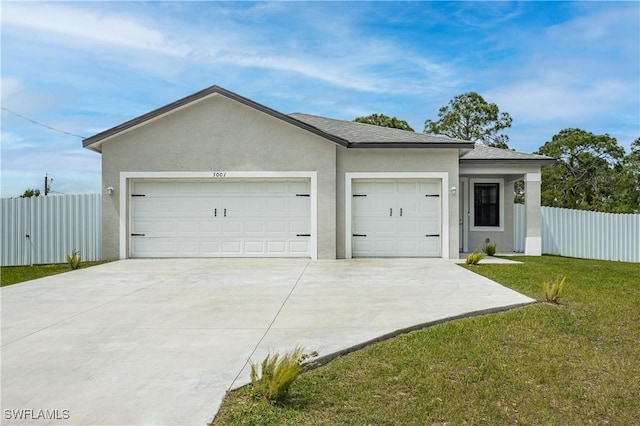 garage featuring a yard