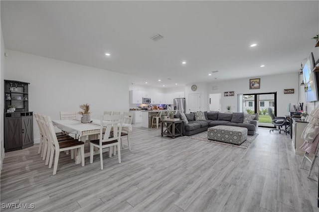 dining area featuring light hardwood / wood-style flooring