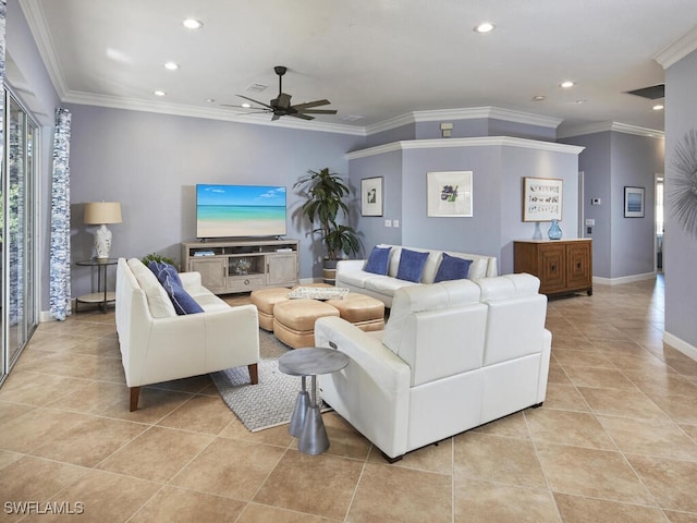 tiled living room featuring ceiling fan and crown molding