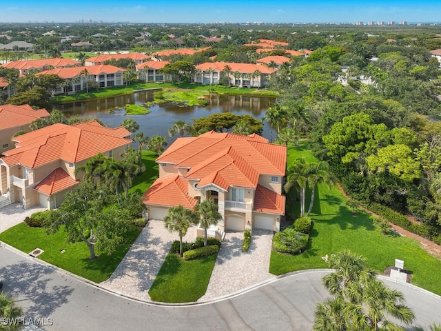 drone / aerial view with a water view