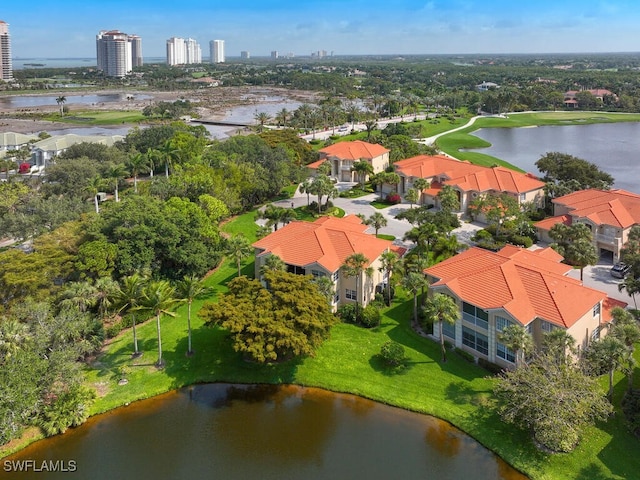 drone / aerial view with a water view