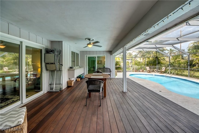 exterior space with a lanai, a patio area, and ceiling fan