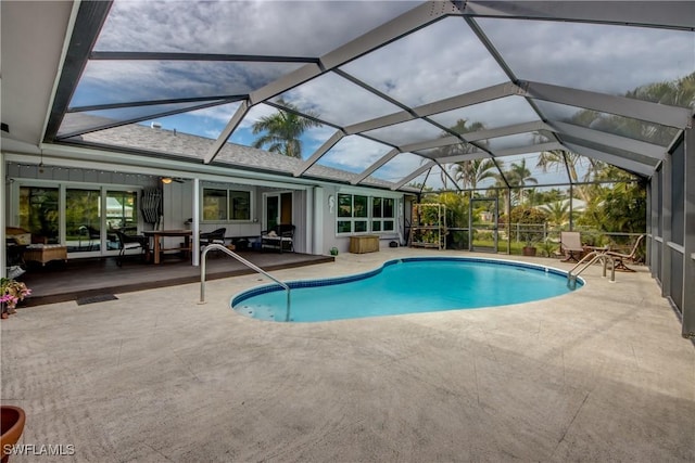 view of pool featuring a lanai and a patio area