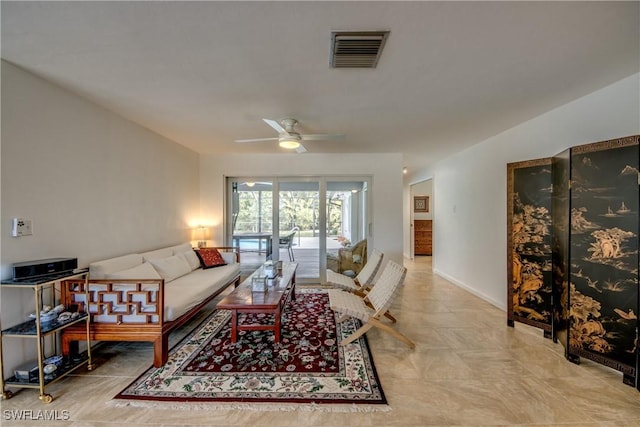 living room featuring ceiling fan