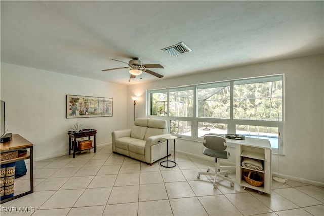 interior space with a wealth of natural light and ceiling fan