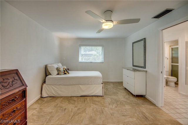 bedroom with ensuite bathroom and ceiling fan