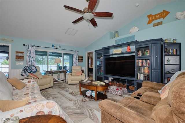 living room with ceiling fan and vaulted ceiling