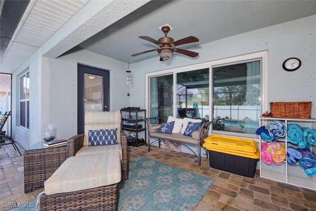 view of patio / terrace featuring ceiling fan