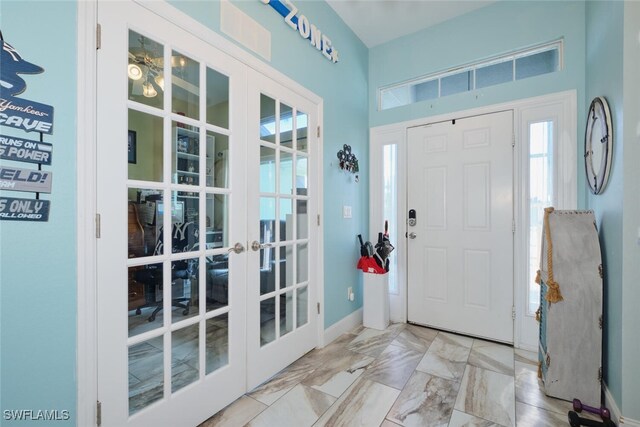 foyer featuring french doors