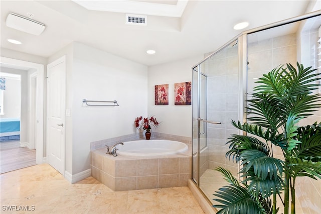 bathroom featuring shower with separate bathtub and tile patterned floors